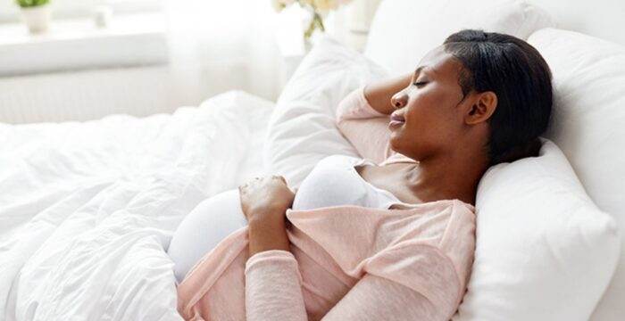 black pregnant woman adobe
