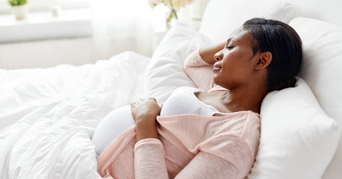 black pregnant woman adobe